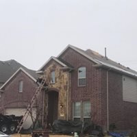 Slide of Cowboys Roofing