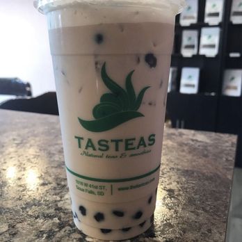 Tasteas - a drink in a plastic cup on a counter - Bubble Tea Near Me - New Paltz, New York Tasteas - a drink in a plastic cup on a counter - Bubble Tea Near Me - New Paltz, New York