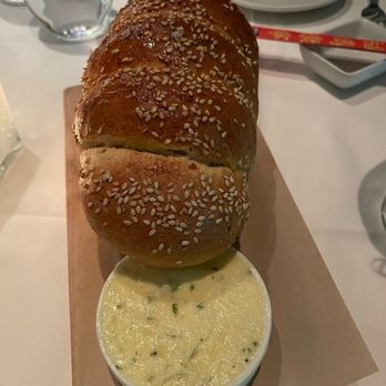 Prime - Sesame - Potato Bread with truffle butter - American Near Me - Huntington, New York Prime - Sesame - Potato Bread with truffle butter - American Near Me - Huntington, New York