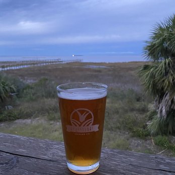 Scallop Republic - a pint of beer on a deck - Beer Bar Near Me - Port St Joe, Florida Scallop Republic - a pint of beer on a deck - Beer Bar Near Me - Port St Joe, Florida