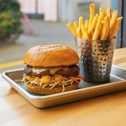Bold Shawarma - Teriyaki Burger. A bold twist on a classic.  lb BC Chuck & Brisket, freshly ground by our butcher, Swiss cheese, Korean-style coleslaw, pin