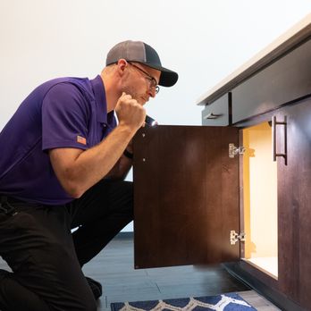 Preferred Pest Management - Technician inspecting under sink - Pest Control Near Me - Gilbert, Iowa Preferred Pest Management - Technician inspecting under sink - Pest Control Near Me - Gilbert, Iowa