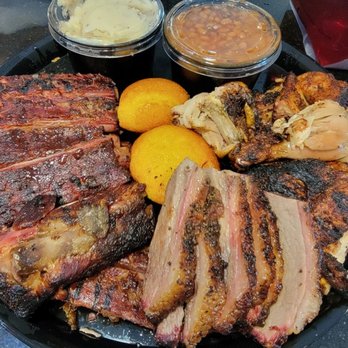 Famous Dave's Bar-B-Que - a plate of meat and sides - Barbeque Near Me - Las Vegas, Nevada Famous Dave's Bar-B-Que - a plate of meat and sides - Barbeque Near Me - Las Vegas, Nevada