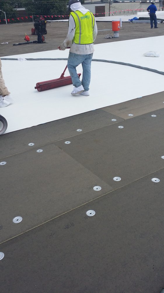 Slide of Yankees Roofing