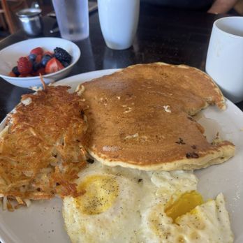 Branch Breakfast - Breakfast platter featuring pancakes, eggs, hash browns and fruit. There's a couple of bites missing - Breakfast & Brunch Near Me - Fresno, California