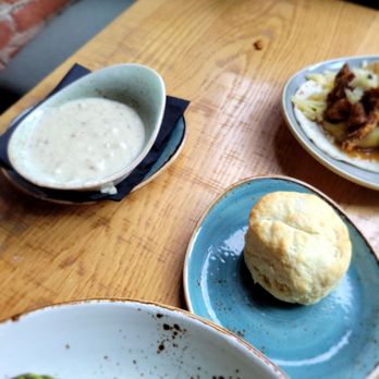 LouVino OTR - Biscuits and gravy. Biscuit was good but pass on the gravy. - Wine Bars Near Me - Cincinnati, Ohio