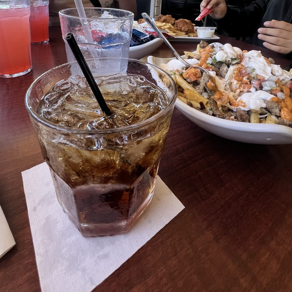 Carne asada fries with jack and coke Carne asada fries with jack and coke