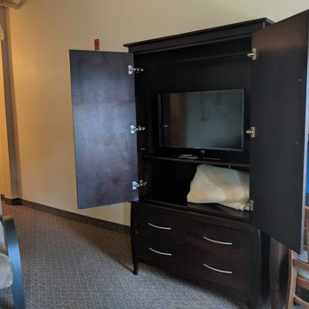 Mercer Hotel - Cabinet houses small TV and extra comforts. - Hotels Near Me - Stratford, Ontario Mercer Hotel - Cabinet houses small TV and extra comforts. - Hotels Near Me - Stratford, Ontario