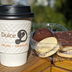 Dulce D Leche Framingham - Relaxing with my chai latte, alfajors, millionaire shortbread from Dulche D Leche.  YUM!