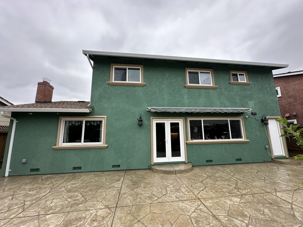 Slide of Umbrella Plastering & Roofing