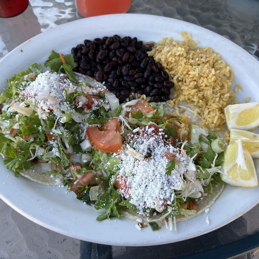 Combination plate with fish and shrimp tacos