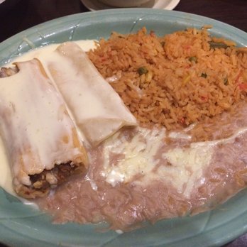 Papitos - Tamale and enchilada combo - Mexican Near Me - Jonesboro, Arkansas Papitos - Tamale and enchilada combo - Mexican Near Me - Jonesboro, Arkansas