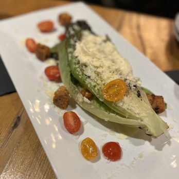 The People’s Kitchen - GRILLED CAESAR grilled romaine | red boat dressing | stone circle focaccia cherry tomato - American Near Me - Lansing, Michigan The People’s Kitchen - GRILLED CAESAR grilled romaine | red boat dressing | stone circle focaccia cherry tomato - American Near Me - Lansing, Michigan