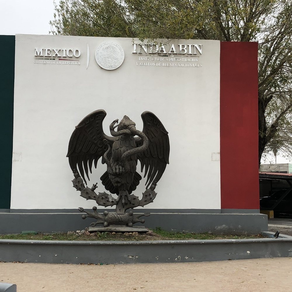 Progresso International Bridge - Mexican Flag statue at entrance - Landmarks & Historical Buildings Near Me - Progreso, Texas Progresso International Bridge - Mexican Flag statue at entrance - Landmarks & Historical Buildings Near Me - Progreso, Texas