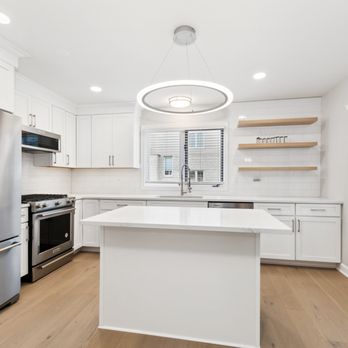 R Brand - a clean kitchen with stainless steel appliances - General Contractors Near Me - Orland Park, Illinois