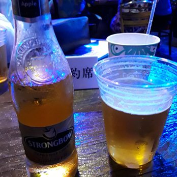 Cuckoo Coconuts Waikiki - Beer on tap and strong bow (apple cider flavored). - Cocktail Bars Near Me - Honolulu, Hawaii