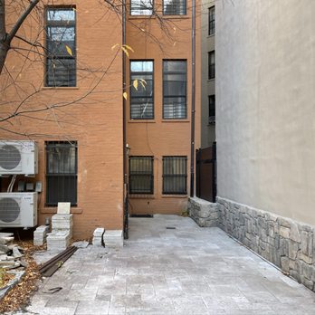 Classic Painter Plus - Harlem Townhouse - Travertine Pavers & HVAC System Installation - General Contractors Near Me