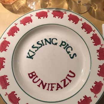 The kissing pigs - French Near Me - Bonifacio, 2A The kissing pigs - French Near Me - Bonifacio, 2A