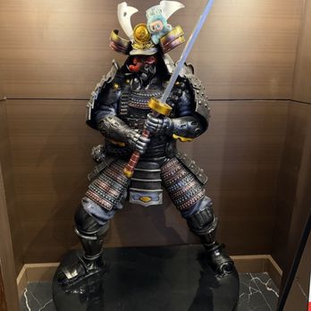 Sushi Rock Grill and Bar - Samurai with Labubu - Sushi Bars Near Me - Altamonte Springs, Florida