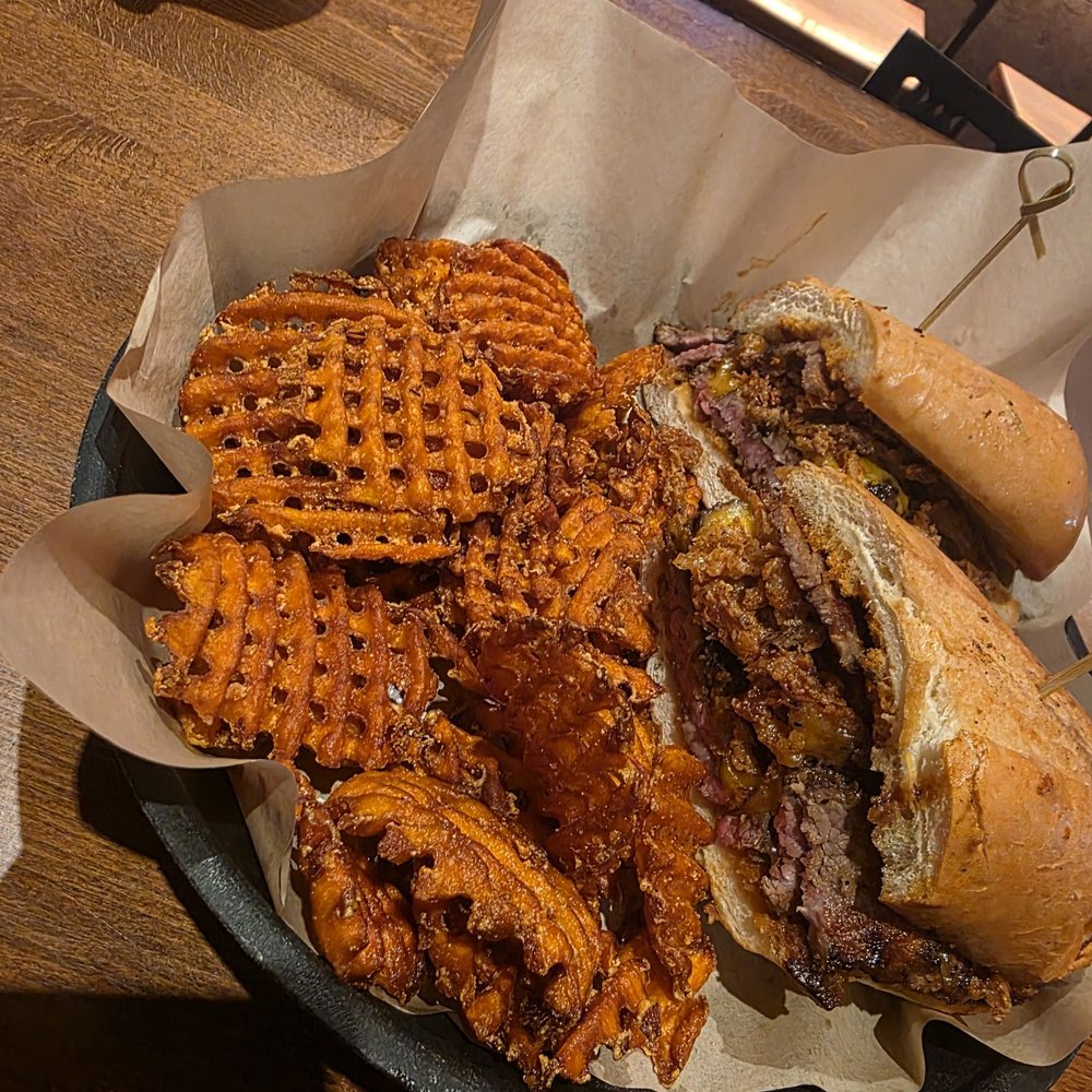Morro Grill - Tri tip sandwich w/ sweet potato waffle fries - American Near Me - Morro Bay, California Morro Grill - Tri tip sandwich w/ sweet potato waffle fries - American Near Me - Morro Bay, California
