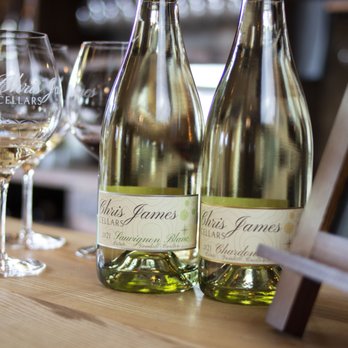 Chris James Cellars - three bottles of wine and three glasses of wine - Wine Tasting Room Near Me - McMinnville, Oregon Chris James Cellars - three bottles of wine and three glasses of wine - Wine Tasting Room Near Me - McMinnville, Oregon