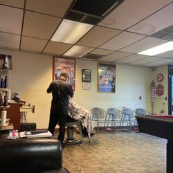 The Clip Joint Barber & Cigar Lounge