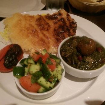 Adana Restaurant - Khoresh Ghormeh Sabzi, crispy rice, grilled tomato, Persian salad ($17). - Middle Eastern Near Me - Glendale, California