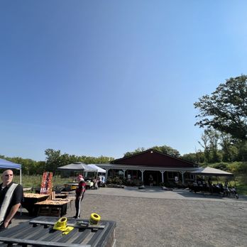 Bella Rose Vineyard & Winery - a man standing next to a picnic table - Wine Tasting Room Near Me - Lewiston, New York Bella Rose Vineyard & Winery - a man standing next to a picnic table - Wine Tasting Room Near Me - Lewiston, New York