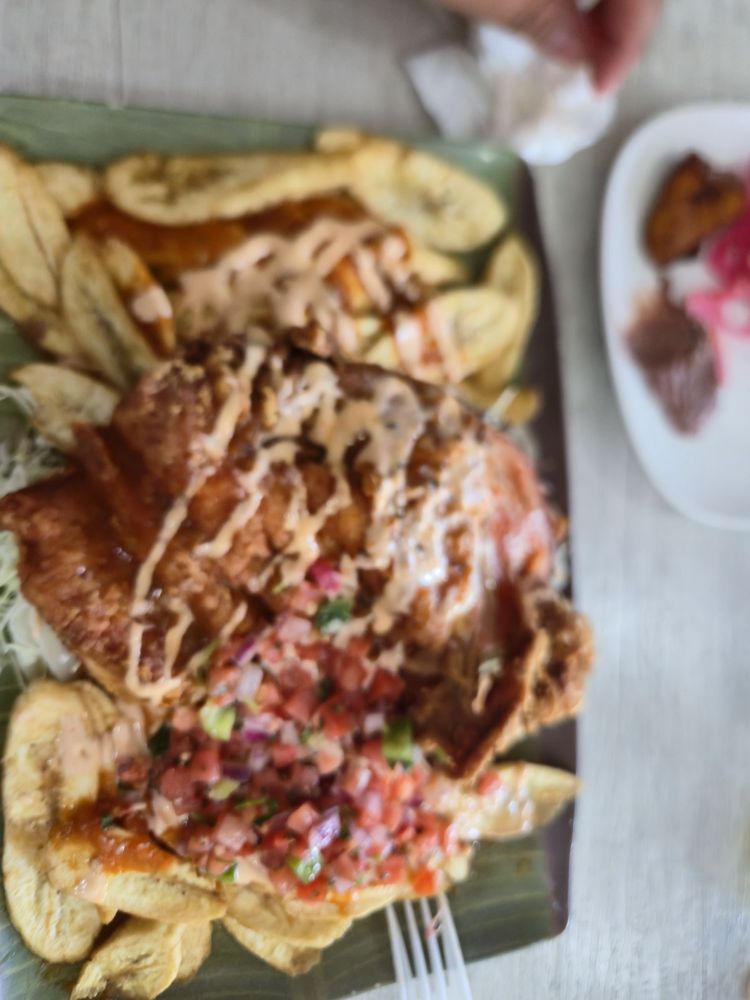 El Pollo Con Tajadas