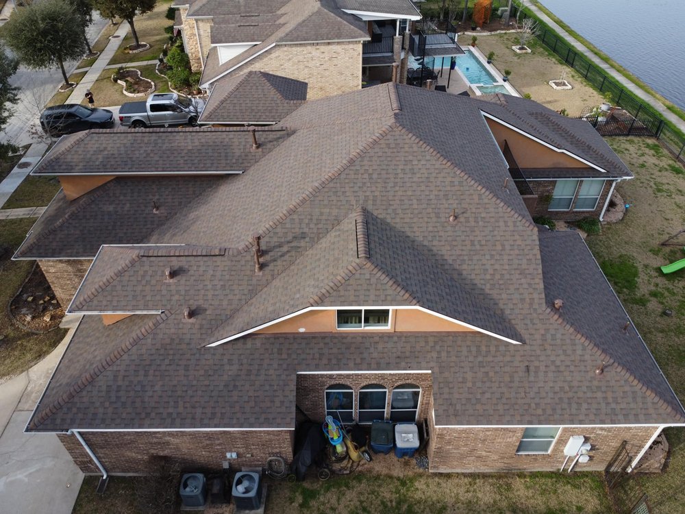 Slide of Dynasty Roofing and Construction