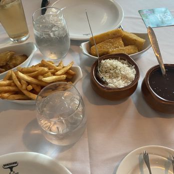 Bonissoni Brazilian Steakhouse - Fried plantains, French fries,  black beans, rice, fried polenta - Brazilian Near Me - Ogunquit, Maine
