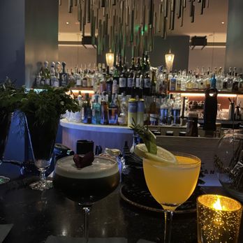 Civility & Unrest - two cocktails on a bar - Cocktail Bars Near Me - Bellevue, Washington