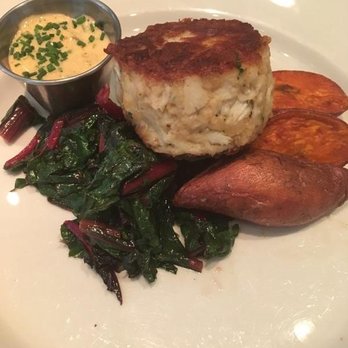 Old Ebbitt Grill - Crab cake with sweet potato fingerling and sautéed chard. Forgot the name of the sauce but it complimented the crab cakes well. - Bars Near Me - Washington, DC, District of Columbia Old Ebbitt Grill - Crab cake with sweet potato fingerling and sautéed chard. Forgot the name of the sauce but it complimented the crab cakes well. - Bars Near Me - Washington, DC, District of Columbia