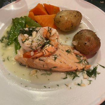 Phillips European Restaurant - Salmon & Shrimp with roasted potatoes, snap peas and carrots. Yummy! - Wine Bars Near Me - Rochester, New York Phillips European Restaurant - Salmon & Shrimp with roasted potatoes, snap peas and carrots. Yummy! - Wine Bars Near Me - Rochester, New York
