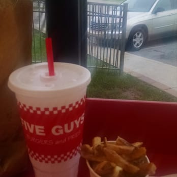 Five Guys - Fit as many fries into the cup as I could ... still a whole bunch left in the bag (not pictured).  This is a small fries, by the way. - Burgers Near Me - Reynoldsburg, Ohio