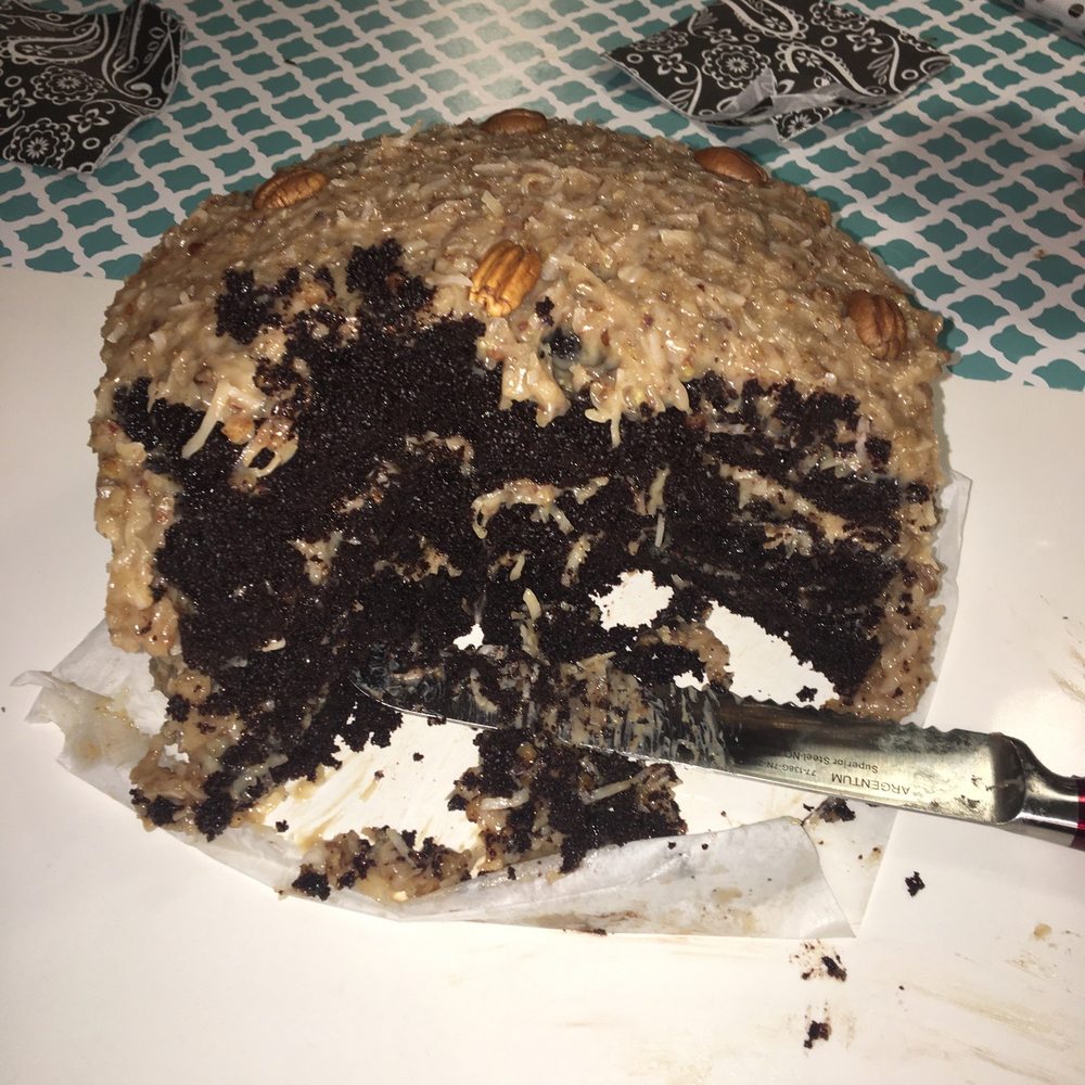 a half eaten chocolate cake