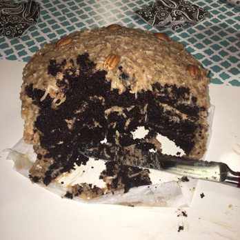 Cafe Sweets Bakery - a half eaten chocolate cake - Bakeries Near Me - West Palm Beach, Florida