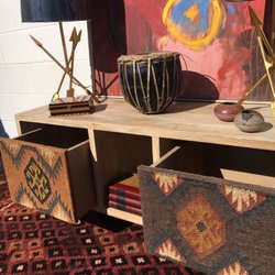 Consign By Design - Kilim Rug, Storage Bench with Kilim Drawer, Original Abstract Painting, Gold Painted Arrow Lamp.