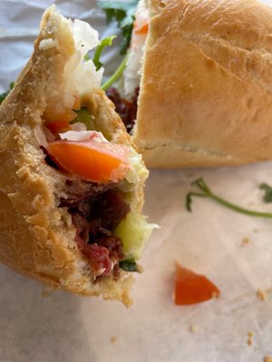 Avian Water and Banh Mi Sandwich by null