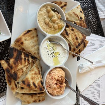 Hellenic Greek Kitchen - 3 Dips -- from left to right hummus, tzatziki, spicy feta - Greek Near Me - Charlotte, North Carolina