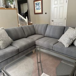 Roe and Company Furniture Studio - New couch, rug and throw pillows (from Home Goods) What an amazing transformation.