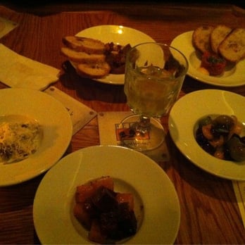 Watershed - Clockwise from left: cabbage salad, smoked eggplant caponata, steak tartare, olives, beets - Lounges Near Me - Chicago, Illinois Watershed - Clockwise from left: cabbage salad, smoked eggplant caponata, steak tartare, olives, beets - Lounges Near Me - Chicago, Illinois