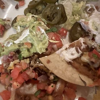 Chuy's - Terrible nachos. Charges $1.20 for sour cream! - Mexican Near Me - Round Rock, Texas Chuy's - Terrible nachos. Charges $1.20 for sour cream! - Mexican Near Me - Round Rock, Texas