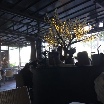 Roaring Fork - Outdoor patio for happy hour with misters. At 97, it's perfect out here. - American Near Me - Scottsdale, Arizona Roaring Fork - Outdoor patio for happy hour with misters. At 97, it's perfect out here. - American Near Me - Scottsdale, Arizona