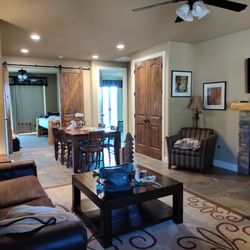 Inn the Woods Suites - Living room and kitchen showing two bedrooms.