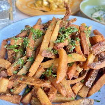 District Table and Bar - HH truffle fries (made vegan) - New American Near Me - Stuart, Florida
