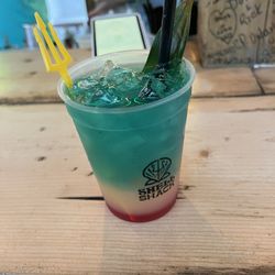 JC's Tiki Bar - The Foley- Gold Rum, Blue Curaçao, Orange Juice and Grenadine.