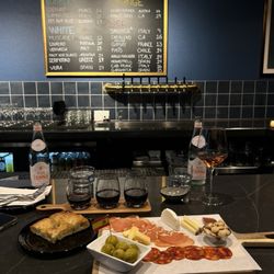 Crush Pad Wine Bar & Bottle Shop - Spanish charcuterie board, focaccia bread, wine flight