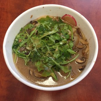 Scratch Kitchen - Pimp My Grits:  mushroom medley + poached eggs + marsala cream + arugula + truffle essence - Breakfast & Brunch Near Me - Honolulu, Hawaii