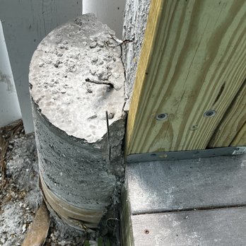 Complete Painting & Carpentry - Is that post even on the footing?? Upper deck should be supported shouldn't it? These guys are total pros. - Painters Near Me Complete Painting & Carpentry - Is that post even on the footing?? Upper deck should be supported shouldn't it? These guys are total pros. - Painters Near Me